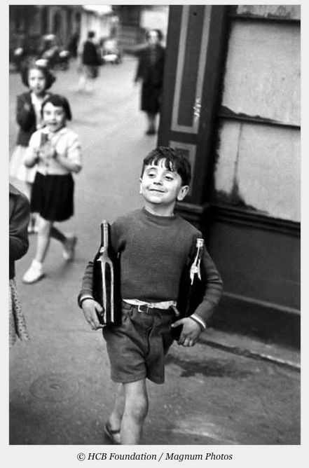 Henri Cartier-Bresson - kid with bottles